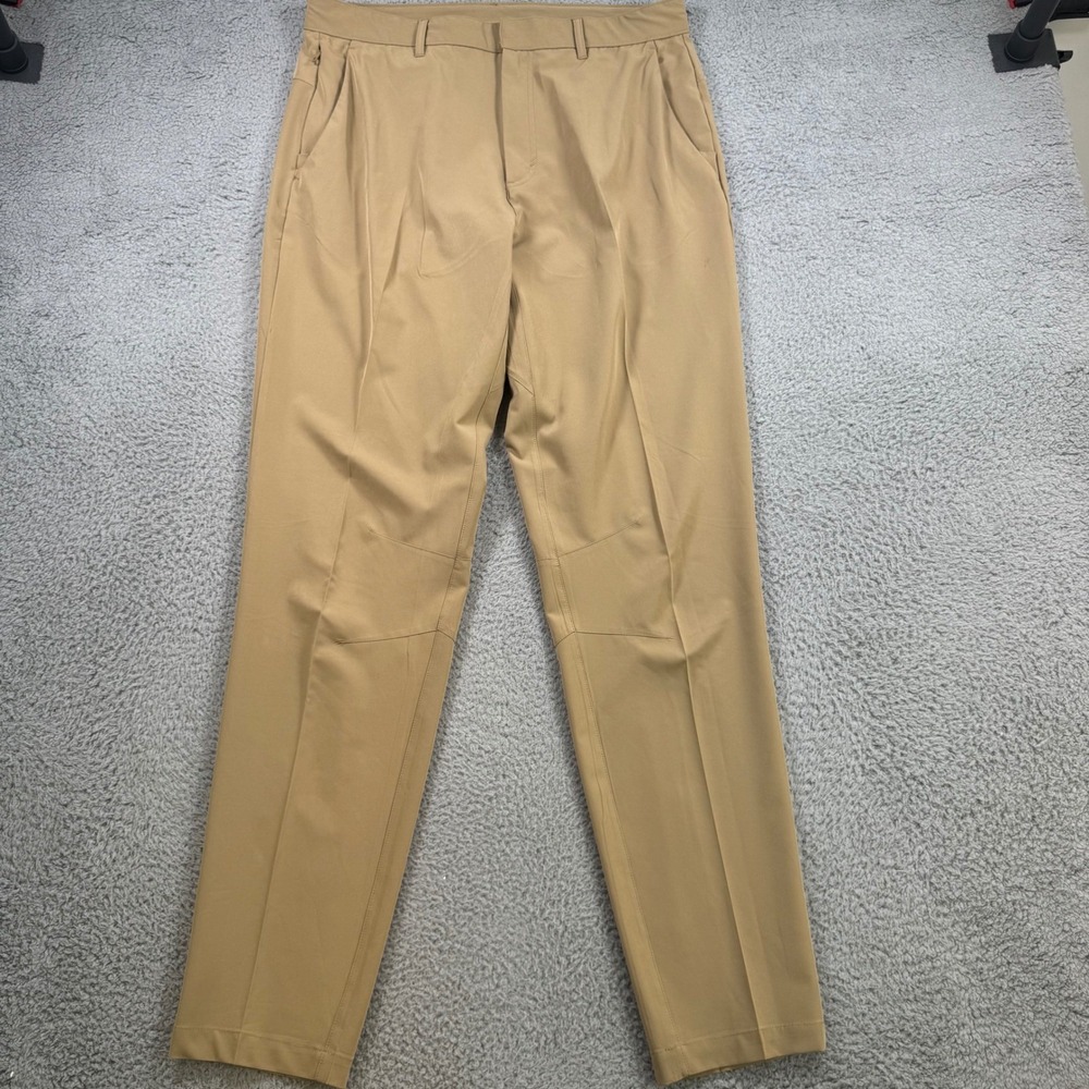 Fabletics Mens 34x34 The Only Pant Khaki Tan Performance Stretch Commuter Golf